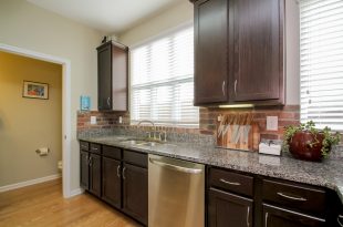 Dark Cabinets and Stainless Appliances
